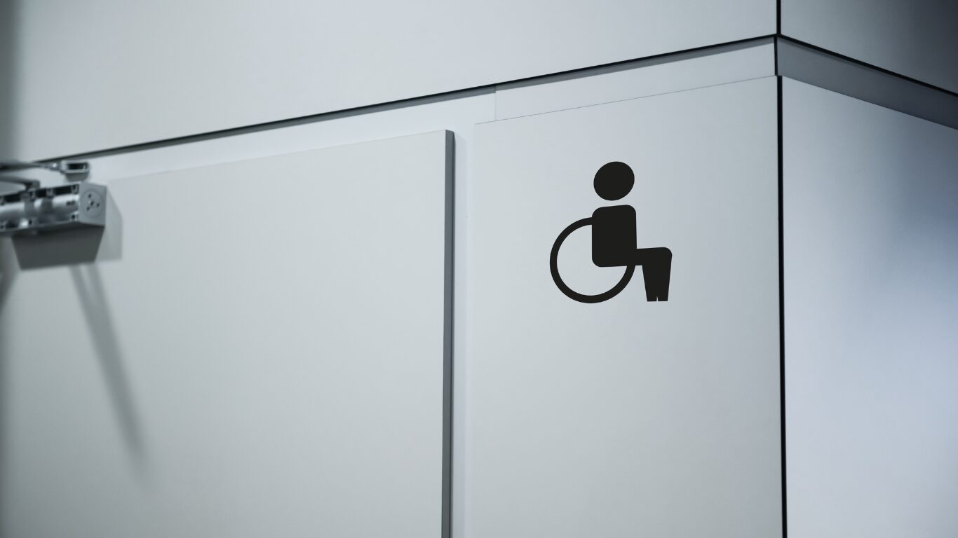 Toilet that is disabled access inside a building.